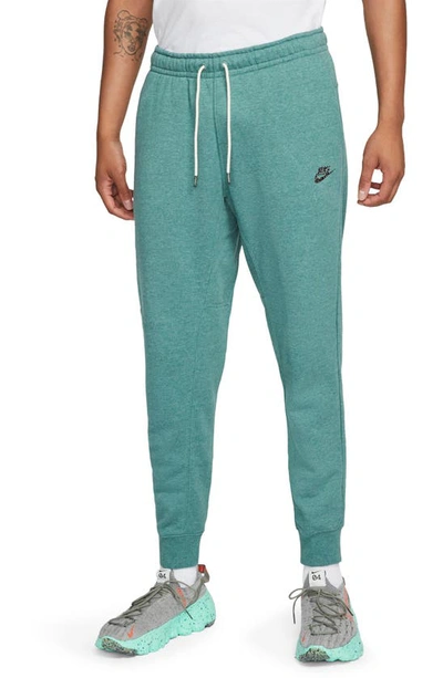 Shop Nike Sportswear Essential Fleece Joggers In Bicoastal/ Multi-color