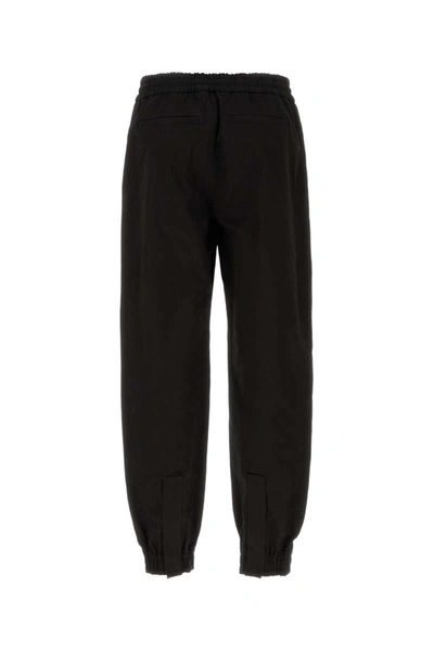 Shop Alexander Mcqueen Pants In Black