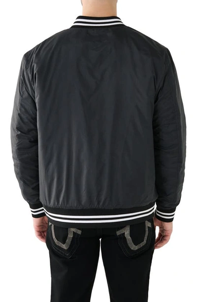 Shop True Religion Brand Jeans Arch Logo Bomber Jacket In Jet Black