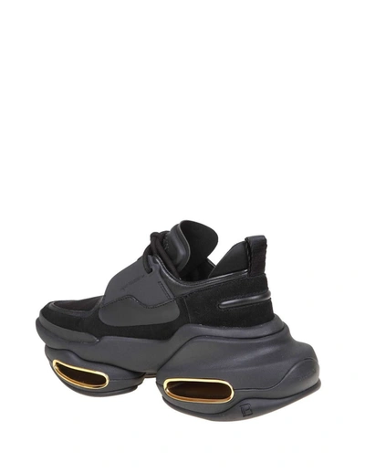 Shop Balmain Sneakers In Leather And Fabric In Black