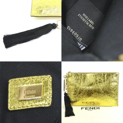 Shop Fendi Pocket Gold Leather Clutch Bag ()
