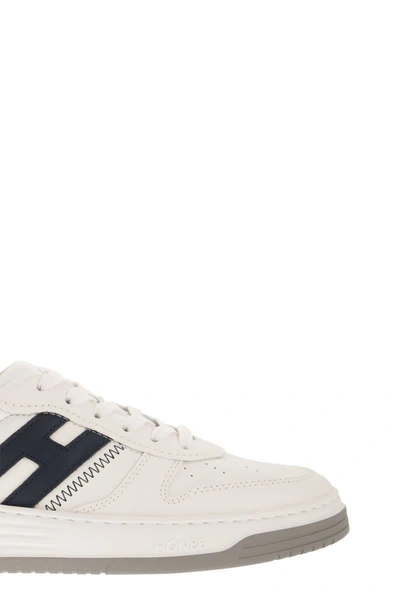 Shop Hogan Sneakers H630 In White