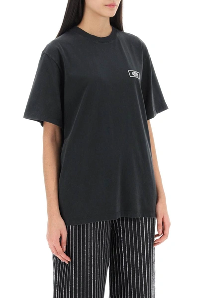 Shop Rotate Birger Christensen Rotate Faded-effect T-shirt With Logo Embroidery In Black