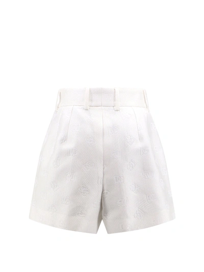 Shop Dolce & Gabbana Cotton Blend Shorts With All-over Logo