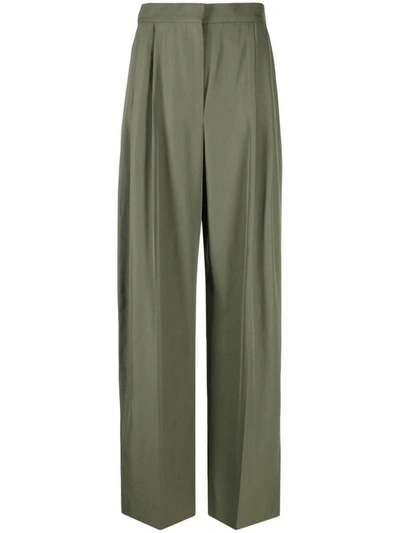 Shop Alexander Mcqueen Trousers In Military Green