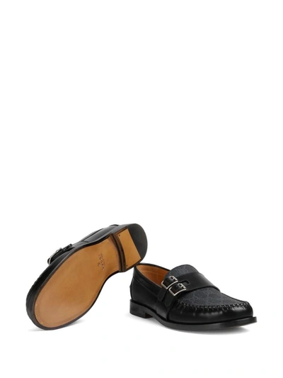 Shop Gucci Gg Motif Leather Loafers In Black