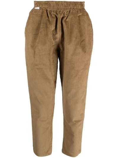 Shop Family First Trousers In Beige