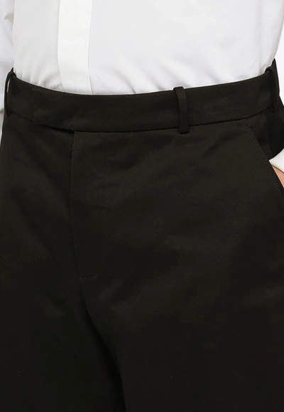 Alexander Mcqueen 4-pocketed Wide Leg Cotton Shorts In Black