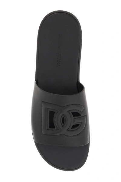 Shop Dolce & Gabbana Leather Slides With Dg Cut-out Men In Black