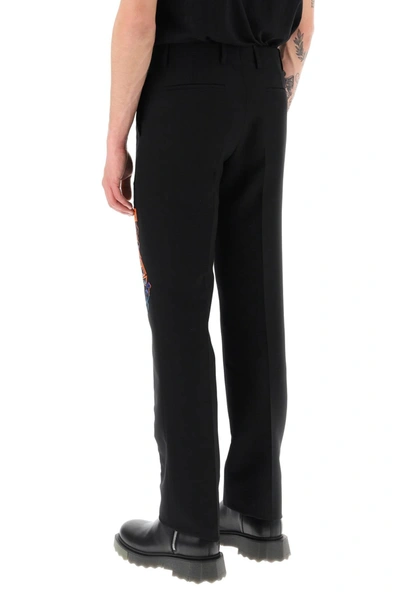 Shop Off-white Slim Pants With Graffiti Patch Men In Black