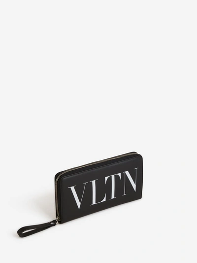 Shop Valentino Garavani Leather Logo Maxi Wallet In Black And White