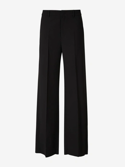 Shop Valentino Tailored Wool Pants In Black