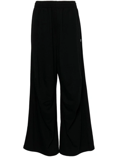 Shop Mm6 Maison Margiela Wide-leg Cotton Trousers In Black