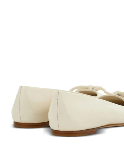 Shop Ferragamo Flat Shoes In White