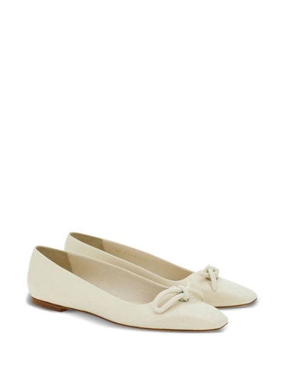 Shop Ferragamo Flat Shoes In White