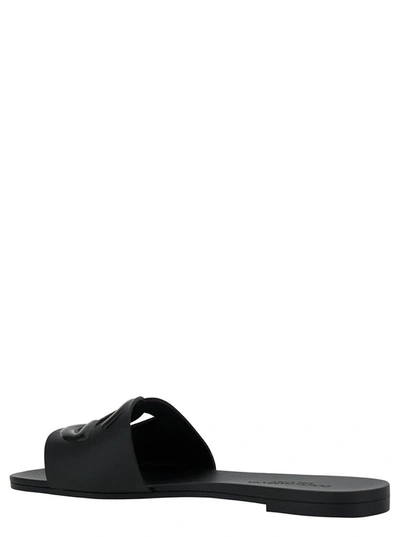 Shop Dolce & Gabbana Rubber Cut Out Mules In Black