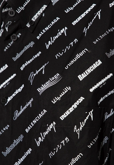Shop Balenciaga All-over Logo Midi Shirt Dress In Black