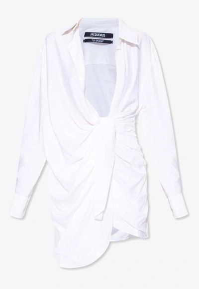 Shop Jacquemus Bahia Asymmetric Mini Shirt Dress In White