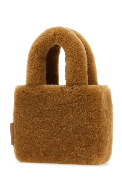Amina Muaddi Rectangular Shearling Handbag With Top Handle In Brown