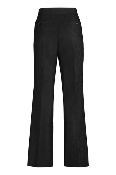 Shop Gucci Gg Motif Jacquard Trousers In Black