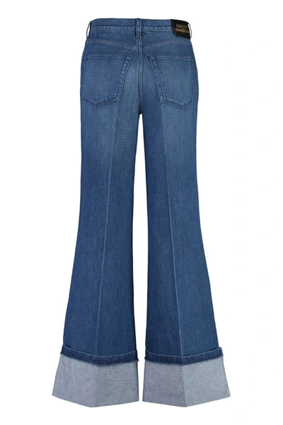 Shop Gucci Wide-leg Jeans In Denim