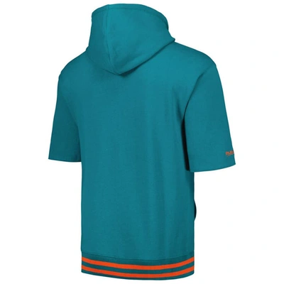 Shop Mitchell & Ness Aqua Miami Dolphins Pre-game Short Sleeve Pullover Hoodie