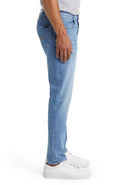 7 For All Mankind Slimmy Tapered Stretch Cotton Jeans In Puzzle