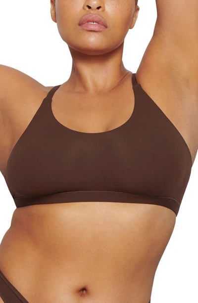 Shop Skims Fits Everybody Racerback Bralette In Cocoa