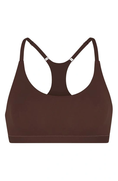 Shop Skims Fits Everybody Scoop Neck Racerback Bralette In Cocoa