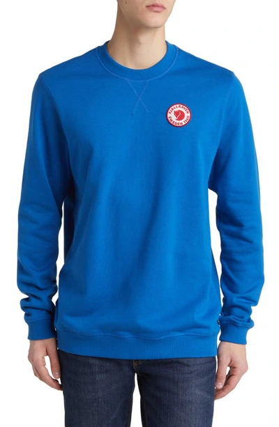 Shop Fjall Raven 1960 Logo Badge Sweatshirt In Alpine Blue