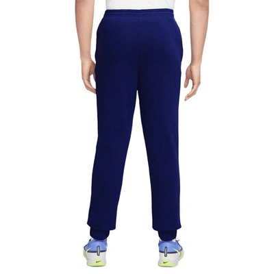 Shop Nike Blue Barcelona Fleece Pants
