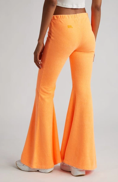 Shop Erl French Terry Flared Wide Leg Pants In Orange