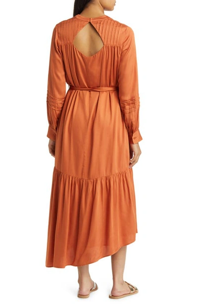 Shop Du Paradis Tie Waist Long Sleeve Asymmetric Maxi Dress In Rust