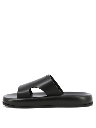 Ferragamo Logo-embossed Leather Slides In Black