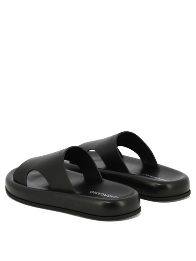 Ferragamo Logo-embossed Leather Slides In Black