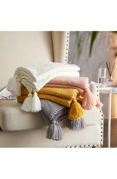 Shop Chic Kerri Cable Knit Fringe Throw Blanket In Blush