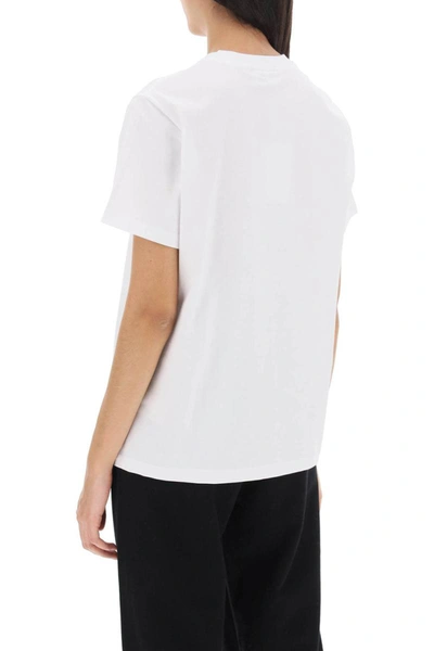 Shop Ganni T-shirt With Graphic Print In White