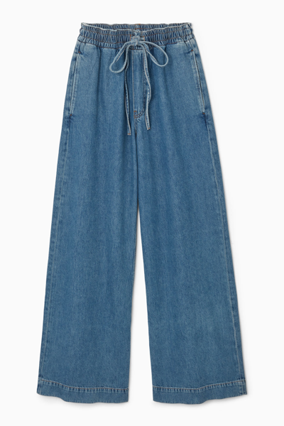 Shop Cos Wide-leg Fluid Denim Trousers In Blue