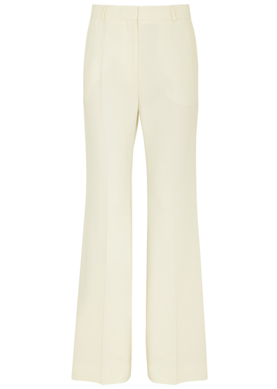 Shop Totême Flared Trousers In Off White