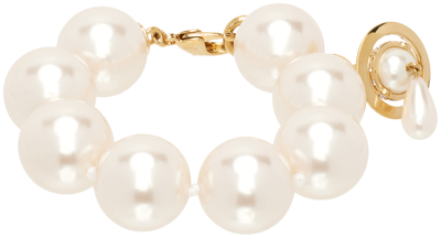 Shop Vivienne Westwood Gold & White Giant Pearl Drop Bracelet In R107 Gold/pearl