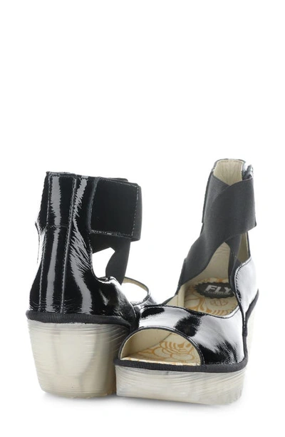 Shop Fly London Yefi Platform Wedge Sandal In Black Luxor