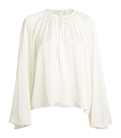 Shop Frame Tie-detail Shirred Blouse In Ivory