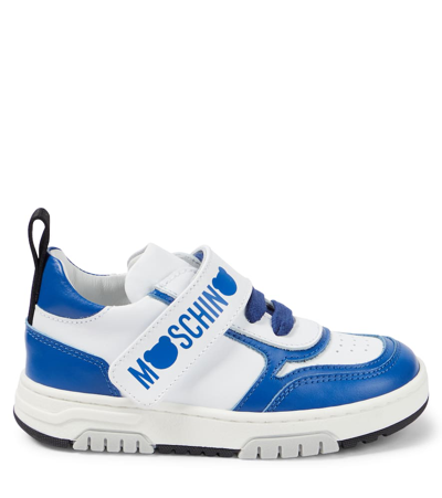 Shop Moschino Logo Leather Sneakers In White