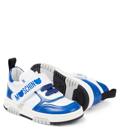 Shop Moschino Logo Leather Sneakers In White