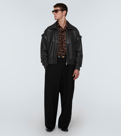 Saint Laurent Distressed Leather Bomber Jacket In Black