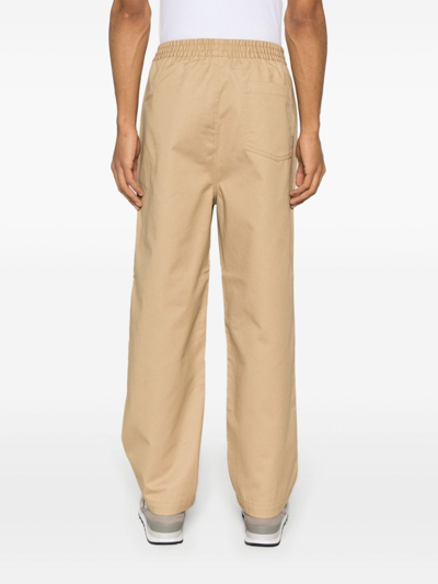 Shop Carhartt Relaxed Straight Fit Pants In Beige
