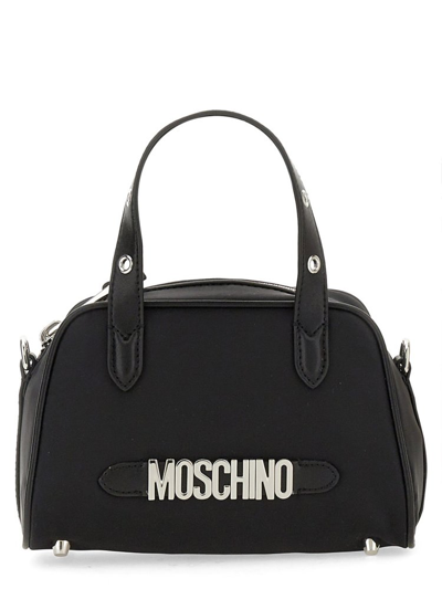 Shop Moschino Logo Lettering Zipped Tote Bag In Black