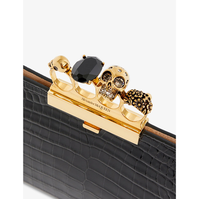 Shop Alexander Mcqueen Four-ring Croc-embossed Leather Clutch In Black