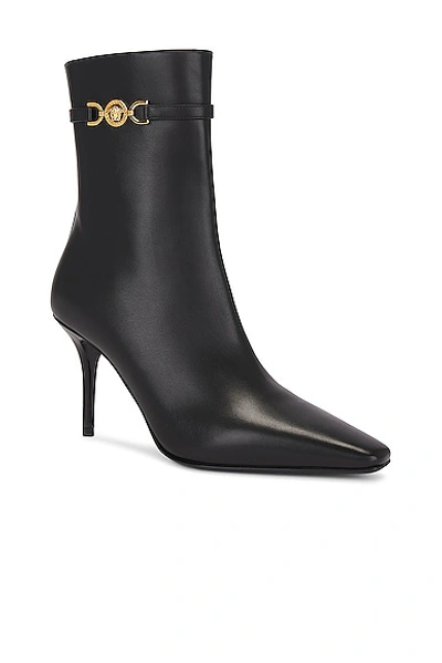 Versace Leather Booties With Logoed Strap And Stiletto Heel 9cm In Black
