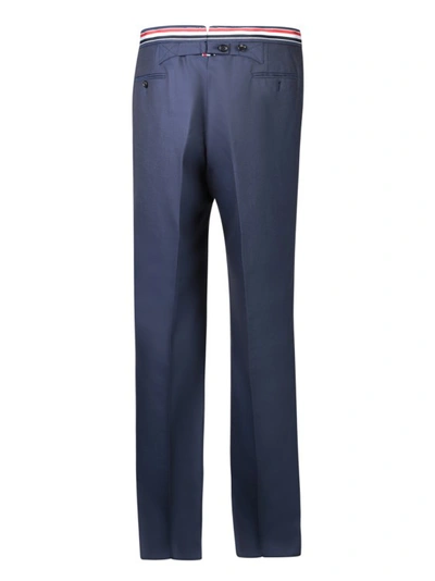 Shop Thom Browne Low Rise Trousers In Blue